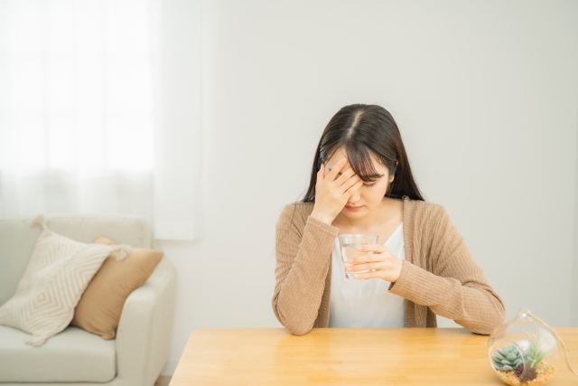 未病による体調不良に悩む女性